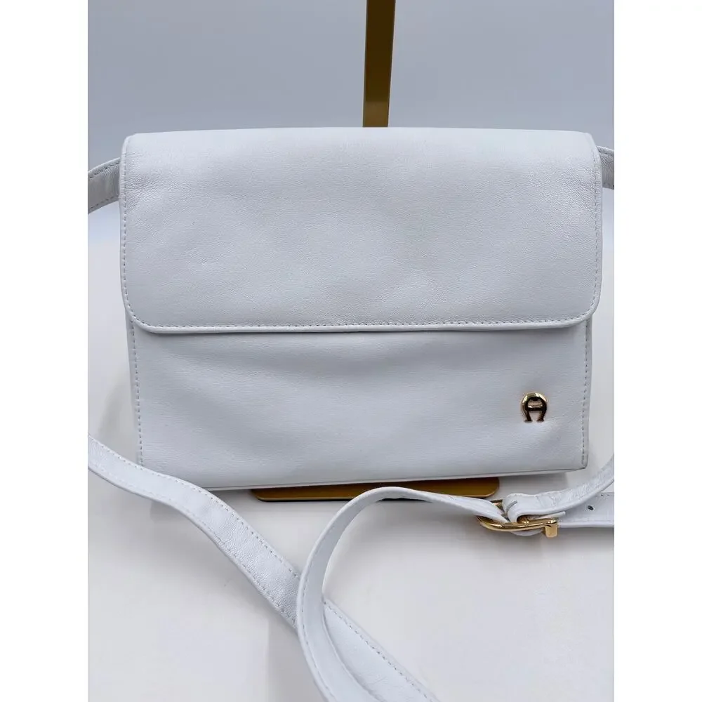 Ettienne white crossbody with wallet, makeup purse, detachable key ring and more